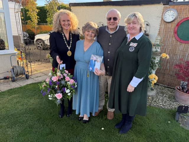 Sana and Tony Forrest, who married on October 8, 1966, were congratulated by  Midlothian Provost Councillor Debbi McCall, left, and the Deputy Lieutenant of Midlothian, The Hon Harriet Dalrymple, right.