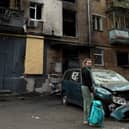 Maria outside her burnt-out home in Kyiv 