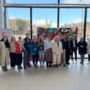 Bereaved parents joined forces to help add names to a Baby Loss Awareness Week 'Milestone Mural' at Omni Centre in Edinburgh.