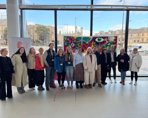 Bereaved parents joined forces to help add names to a Baby Loss Awareness Week 'Milestone Mural' at Omni Centre in Edinburgh.