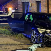 Police and ambulance crews close busy south Edinburgh road after serious two-car crash