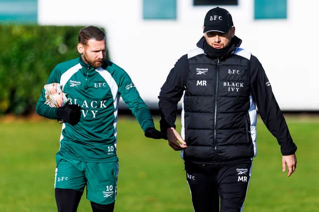 Hibs boss Marink Reedijk and Martin Boyle.