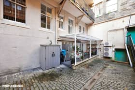 This ground-floor flat on West Port is on the market for £330,000, offering two bedrooms and contemporary accommodation in Edinburgh.