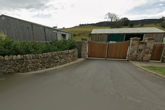 The entrance to the application site at 153 Woodhall Road in Juniper Green.
