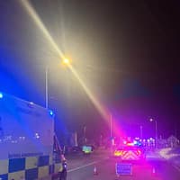 Police and ambulance crews close busy south Edinburgh road after serious two-car crash