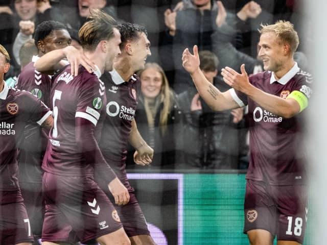 Hearts' Oisin McEntee (C) celebrates with Jamie McCart (L) and Harry Milne (R) after scoring to make it 1-0 during a UEFA Conference League 2026/27 League Phase MD1 match between Heart of Midlothian and FC Nordsjaelland