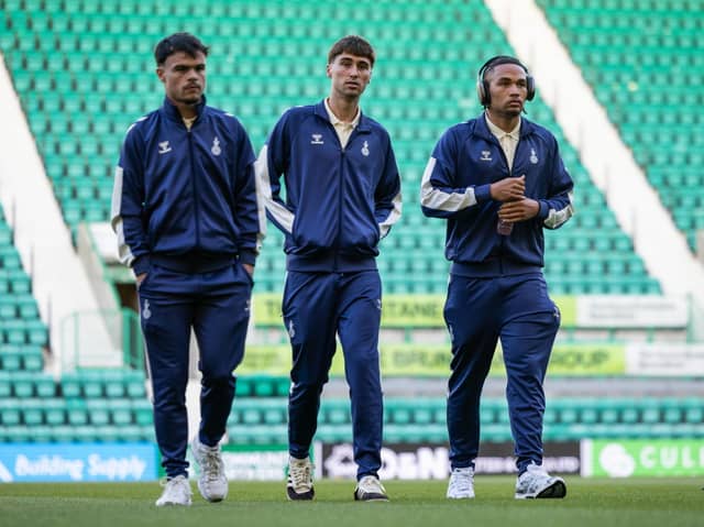 Kilmarnock's Cathal McCartney (C) and MJ Kamson-Kamara (R) 