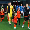 Dundee United's Dylan Tait (R)