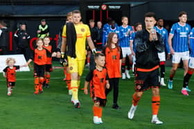  Dundee United's Dylan Tait (R)