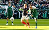Hibernian's Thibault Klidje puts his shot wide of the post during a William Hill Premiership match between Hibernian and Falkirk