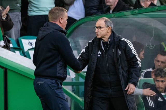 Celtic Manager Martin O'Neill (R) and Hearts Head Coach Wouter Vrancken