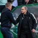 Celtic Manager Martin O'Neill (R) and Hearts Head Coach Wouter Vrancken 