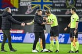 STVV's head coach Wouter Vrancken, Gent's head coach Ivan Leko and referee Lawrence Visser pictured after a soccer match between KAA Gent and STVV