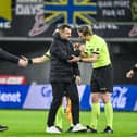 STVV's head coach Wouter Vrancken, Gent's head coach Ivan Leko and referee Lawrence Visser pictured after a soccer match between KAA Gent and STVV