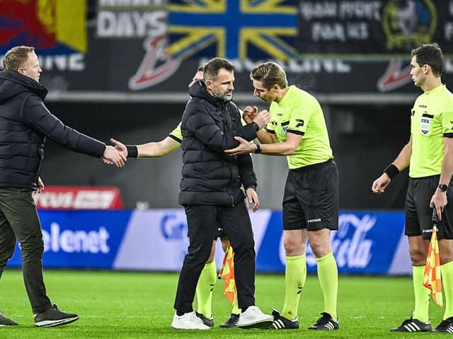 STVV's head coach Wouter Vrancken, Gent's head coach Ivan Leko and referee Lawrence Visser pictured after a soccer match between KAA Gent and STVV