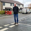 Gary Taylor, who lived at number 27 Baberton Mains Avenue, pictured outside the replacement row of homes which he and his wife are still to be move into, nearly three years after the explosion on December 1, 2023, which killed his neighbour James Smith, 84, and saw two other local residents taken to hospital.