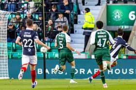  Falkirk's Jacob Murrell scores to make it 1-0 during a William Hill Premiership match between Hibernian and Falkirk 