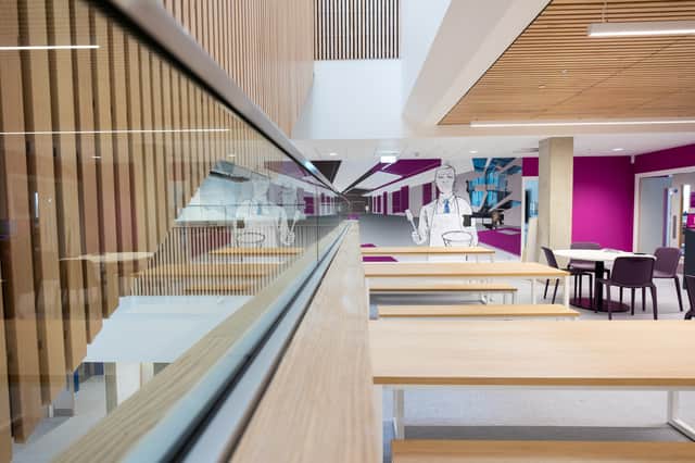 The new building features classrooms, a bright atrium, and breakout and retreat spaces.