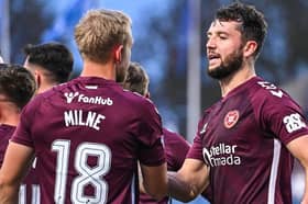 Hearts' Craig Halkett (R) with Harry Milne (L)