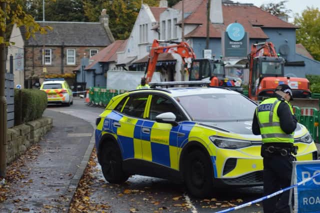 Police outside the pub on Saturday morning