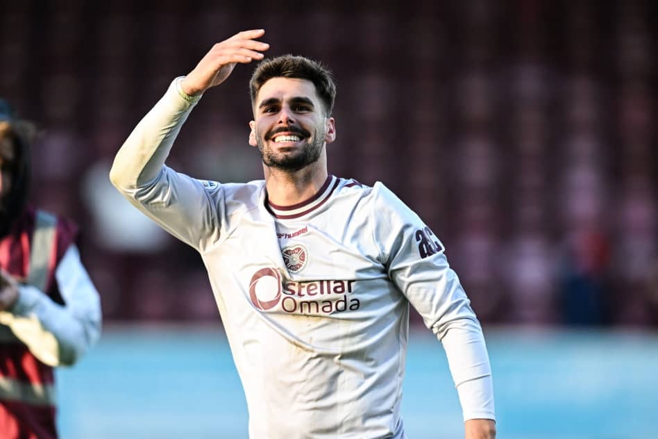 Hearts' Claudio Braga celebrates at full time during a William Hill Premiership match between Motherwell and Heart of Midlothian 