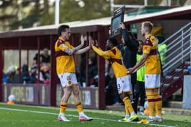 Motherwell's Jordan McGhee, Jardell Kanga and Eythor Bjorgolfsson (L-R) are substituted during a William Hill Premiership match between Motherwell and Heart of Midlothian 