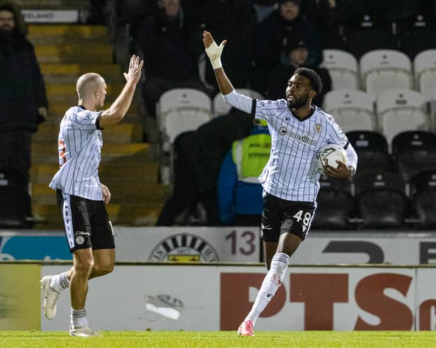  St Mirren's Paul Nsio (R) celebrates scoring to make it 1-1 with teammate Alex Gogic against Hibs