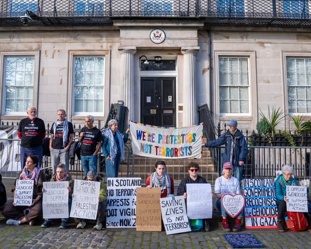People take part in a protest outside the US Consulate in Edinburgh in support of Palestine Action. Picture: Jane Barlow/PA