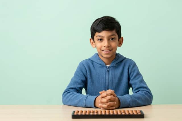 Mivaan with his abacus