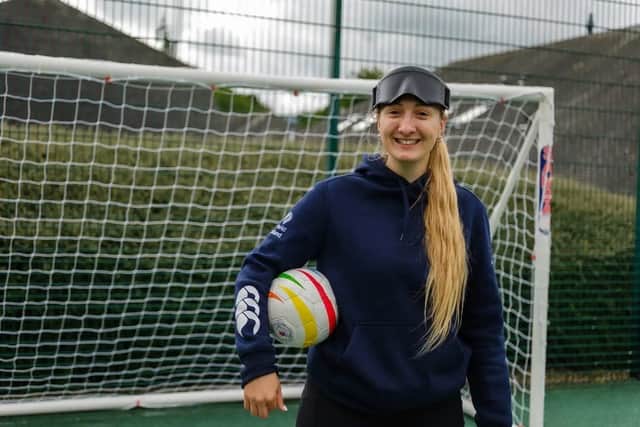 Sam Gough teaching blind football to children at the Royal Blind School