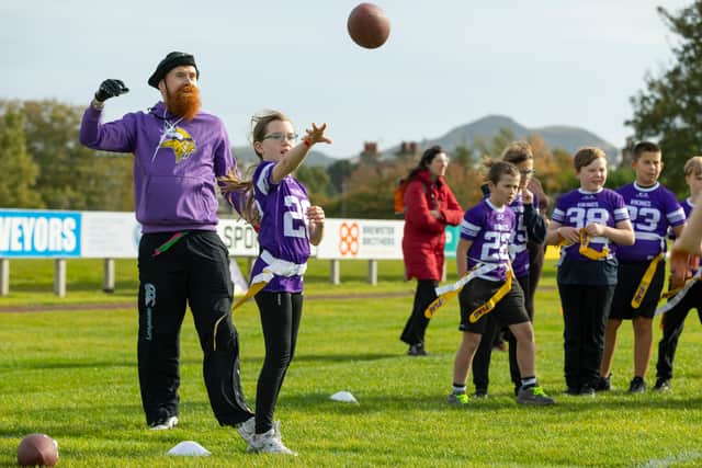 More than 100 local children took part in American Football drills in the capital