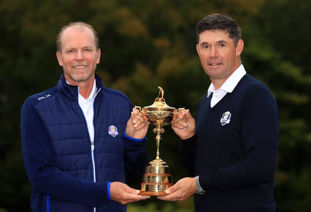 United States Captain Steve Stricker and European Captain Padraig Harrington pose with the Ryder Cup at Whistling Straits Golf Course