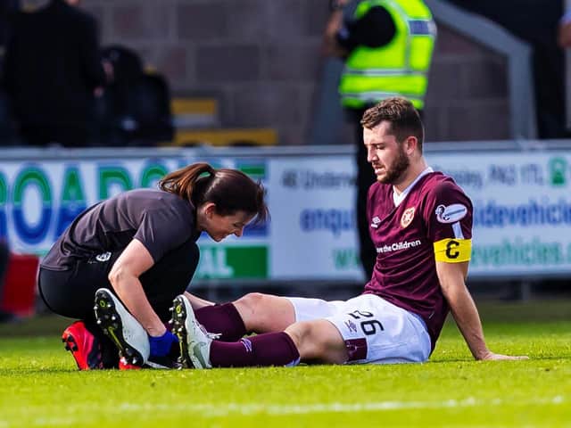 Craig Halkett injured his knee while playing for Hearts against St Mirren. Pic: SNS