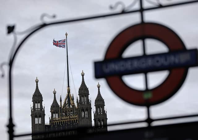 A Union flag flies from a pole atop the Victoria Tower at the Houses of Parliament in London. Picture: AFP/Getty