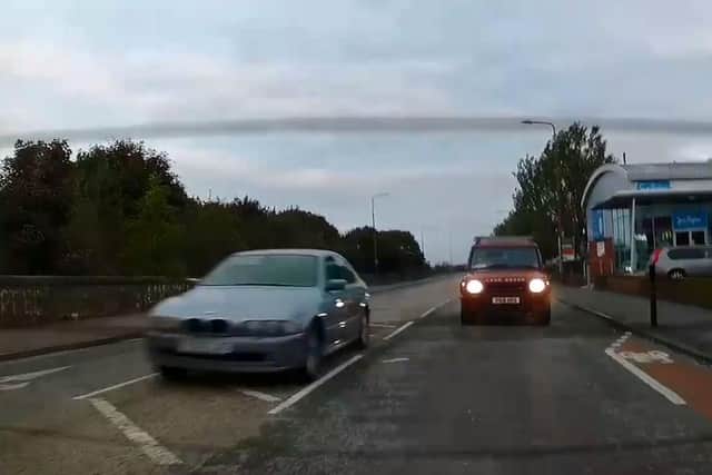 Watch as car in high-speed police chase through north Edinburgh jumps red light and almost ploughs into other cars