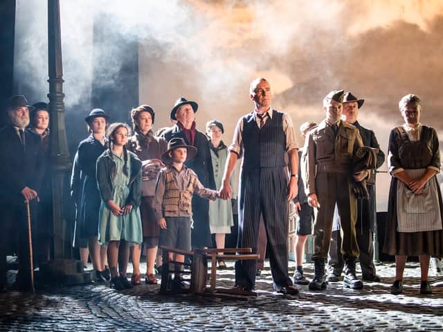 Liam Brennan as Inspector Goole with the cast of An Inspector Calls