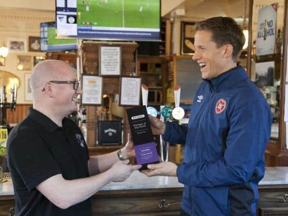 Manager Kevin McGee receiving his award from BT Sport in 2018.
