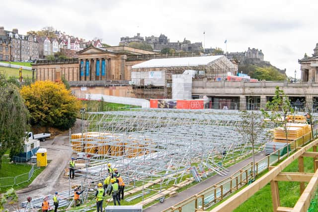 Scaffolding for the Christmas market is erected in Princes Street Gardens