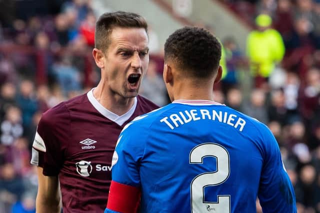 Steven MacLean squares up to Rangers defender James Tavernier late in Sunday's match. Picture: SNS