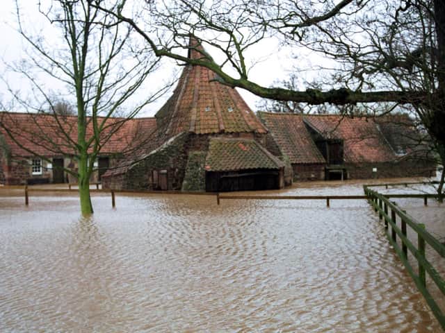 Historic Preston Mill in East Linton was flooded over the weekend. Pictured is the same mill flooded following heavy rain in 1992. Picture: TSPL