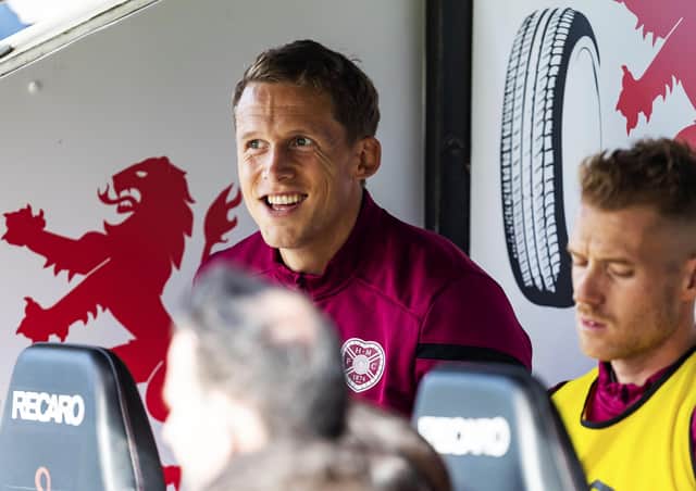 Hearts captain Christophe Berra was named a substitute for Saturday’s clash with St Mirren, although he was quickly called into action. Pic: SNS