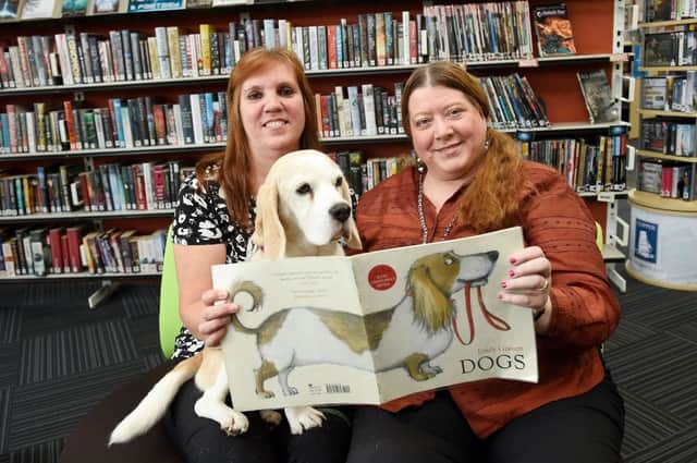 Oxgangs Library is taking part in Bring Your Dog To The Library Day. Librarian Hazel Deans is pictured with her Beagle Flora.  Also pictured is Councillor Amy McNeese-Mechan (right).
