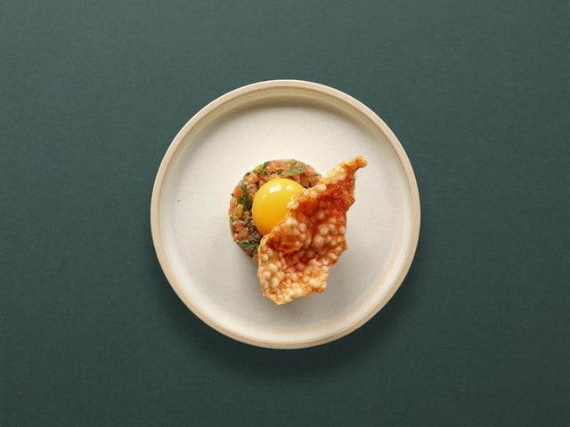 Goats cheese panna cotta, green olive tapenade, tomato tartare, yoghurt yolk
