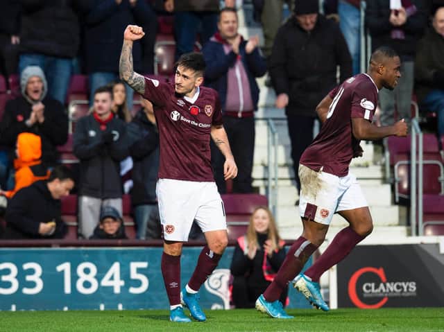 Jamie Walker celebrates after scoring Hearts' fourth goal against St Mirren