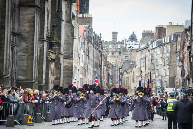 A parade marched from the castle to the City Chambers. Picture: M Owens/Poppyscotland