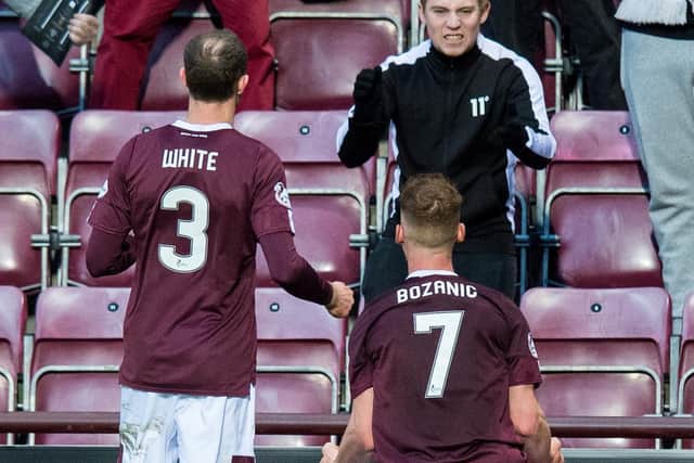 Aidy White and Oliver Bozanic celebrate after the latter put Hearts 3-2 in front against St Mirren.