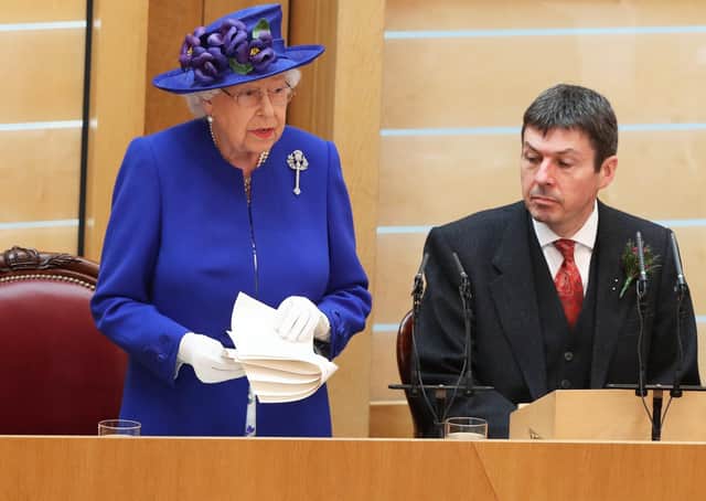 Presiding Officer Ken Macintosh listens intently as the Queen gives a speech to MSPsat the Scottish Parliament in during a ceremony marking the 20th anniversary of devolution in June this year. Picture: Getty