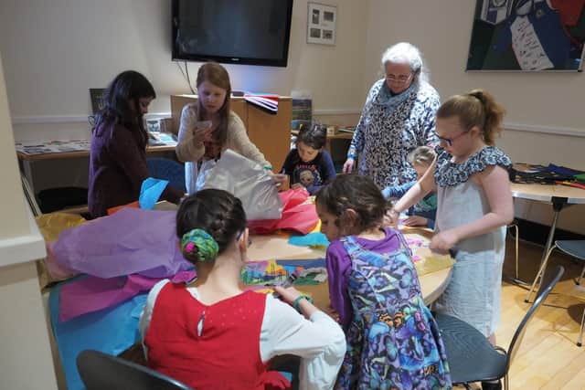 Previous participants enjoying paper craft. Picture: Scottish Council of Jewish Communities.