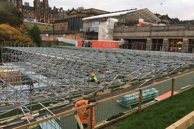 Scaffolding for the Christmas Market goes up in East Princes Street Gardens