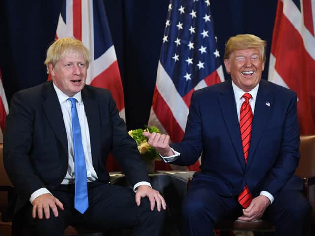 Boris Johnson with US President Donald Trump, whose "fat Presidential fingers" should be kept off the NHS, according to Christine Grahame (Picture: AFP/Getty)